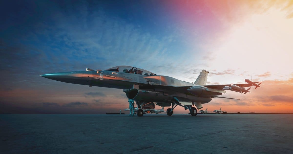 Modern military aircraft on runway at sunset, representing Accura Engineering’s role as a trusted JOSCAR-certified defence and aerospace supplier.